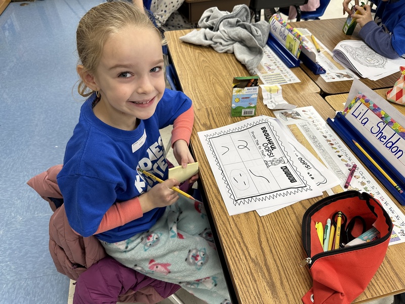 1st Grade student with beautiful oops worksheet 